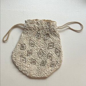 Elegant Cream Beaded Drawstring Bag